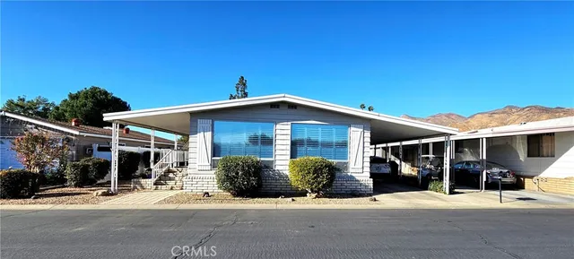 a front view of a house with a garage