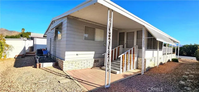 a view of an empty room with windows