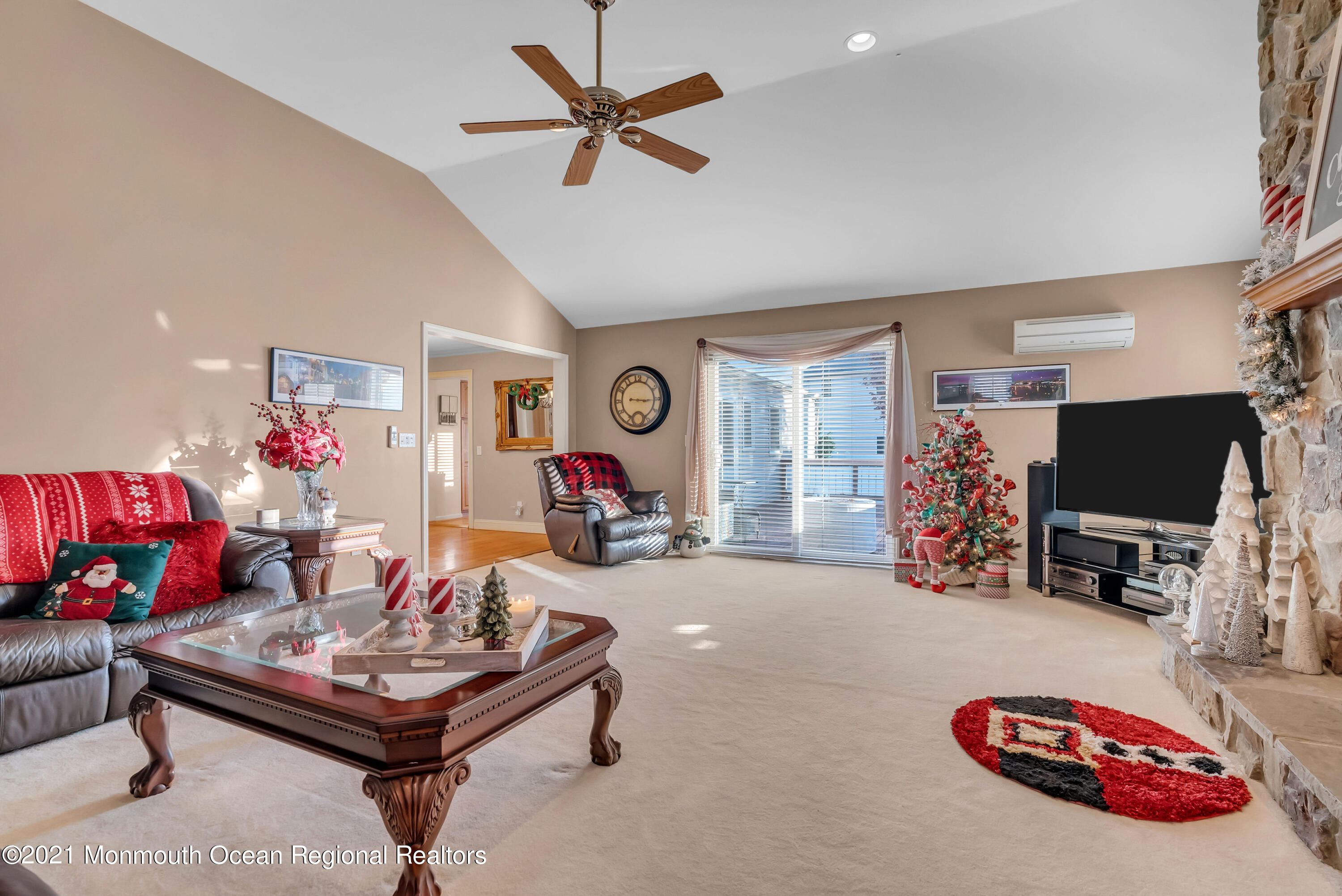 128 Whalepond Road Oakhurst, NJ 07755 - Photo 11 of 33 a living room with furniture and a flat screen tv