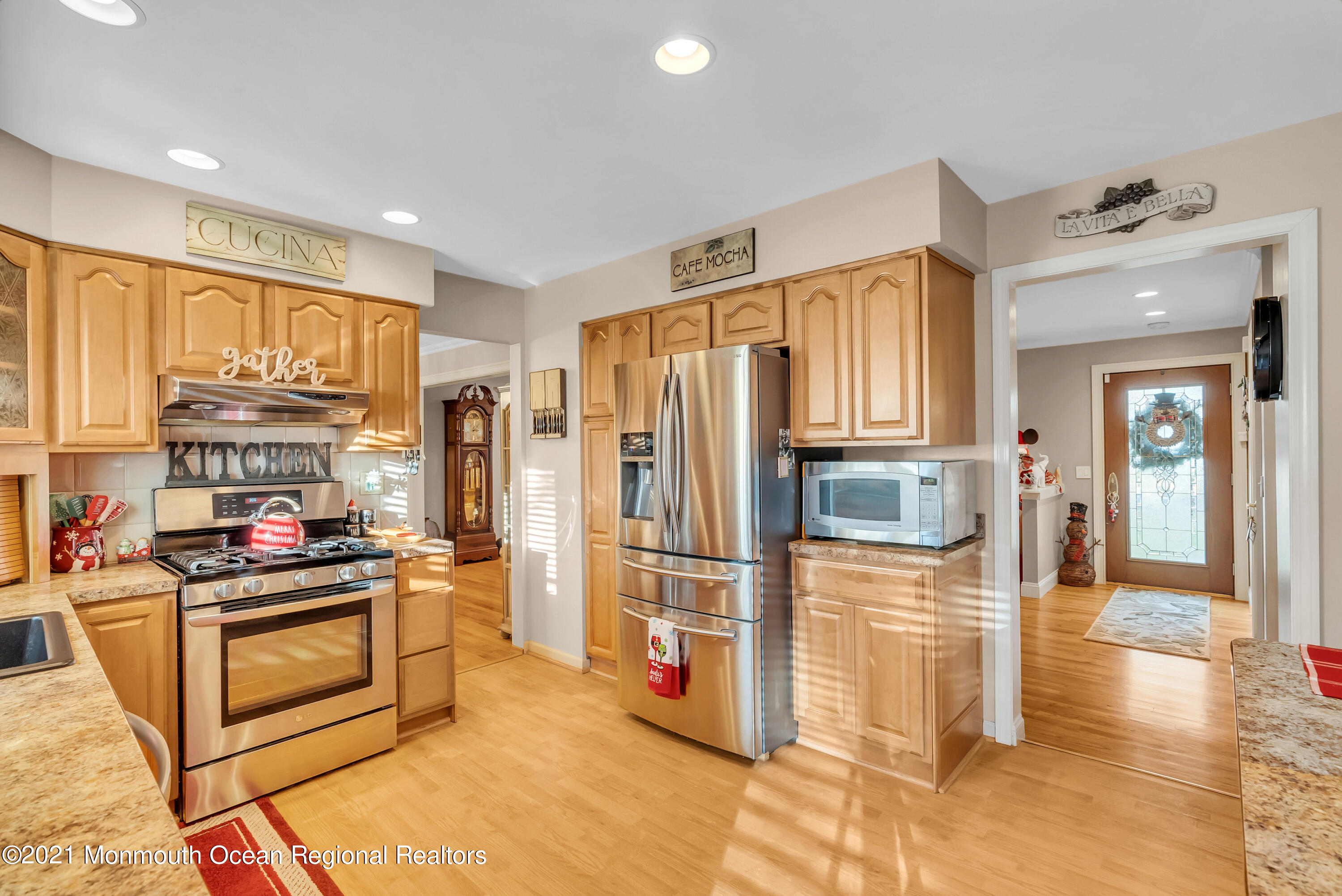128 Whalepond Road Oakhurst, NJ 07755 - Photo 13 of 33 a kitchen with stainless steel appliances granite countertop a refrigerator stove and oven