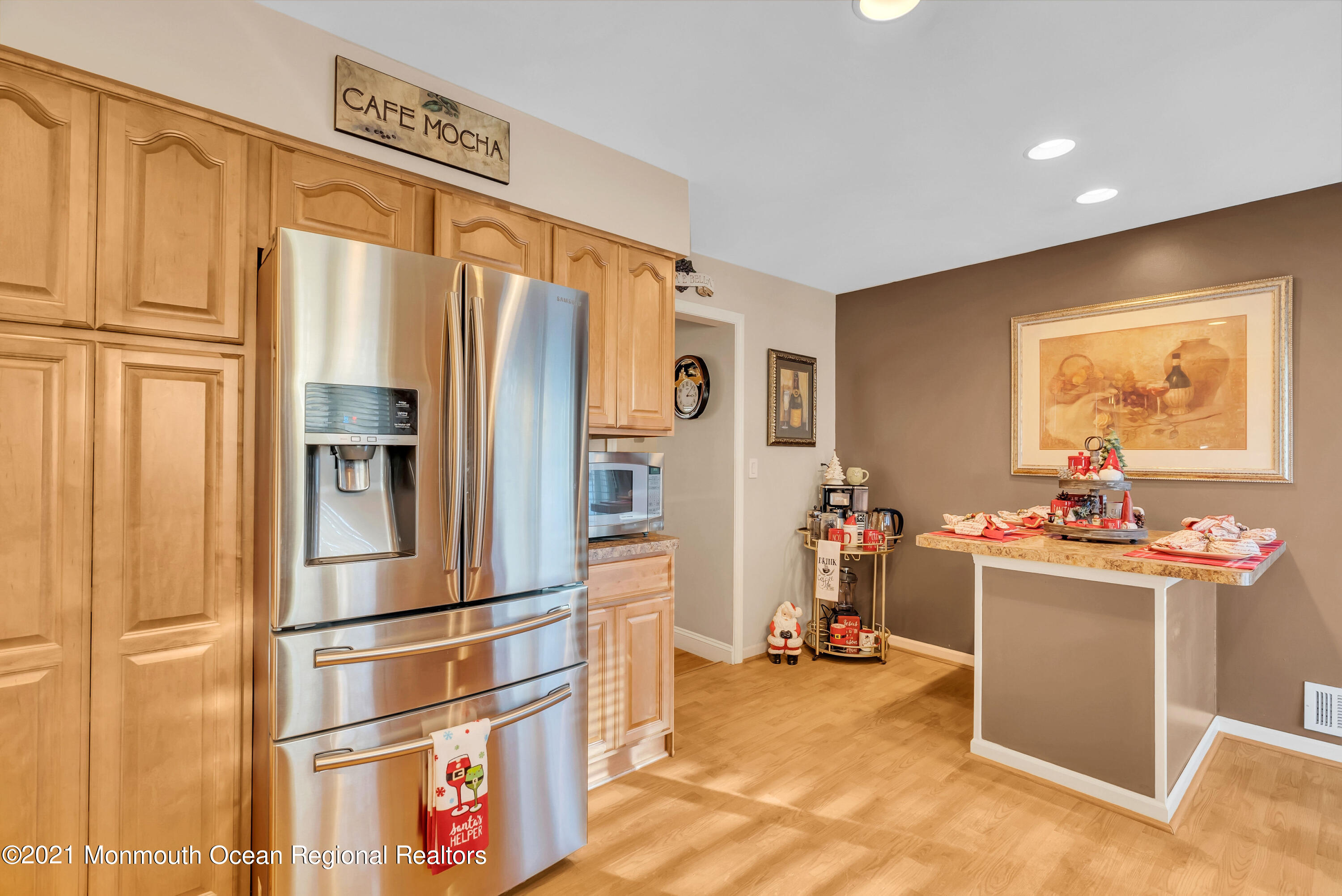 128 Whalepond Road Oakhurst, NJ 07755 - Photo 14 of 33 a kitchen with stainless steel appliances granite countertop a refrigerator and a stove top oven