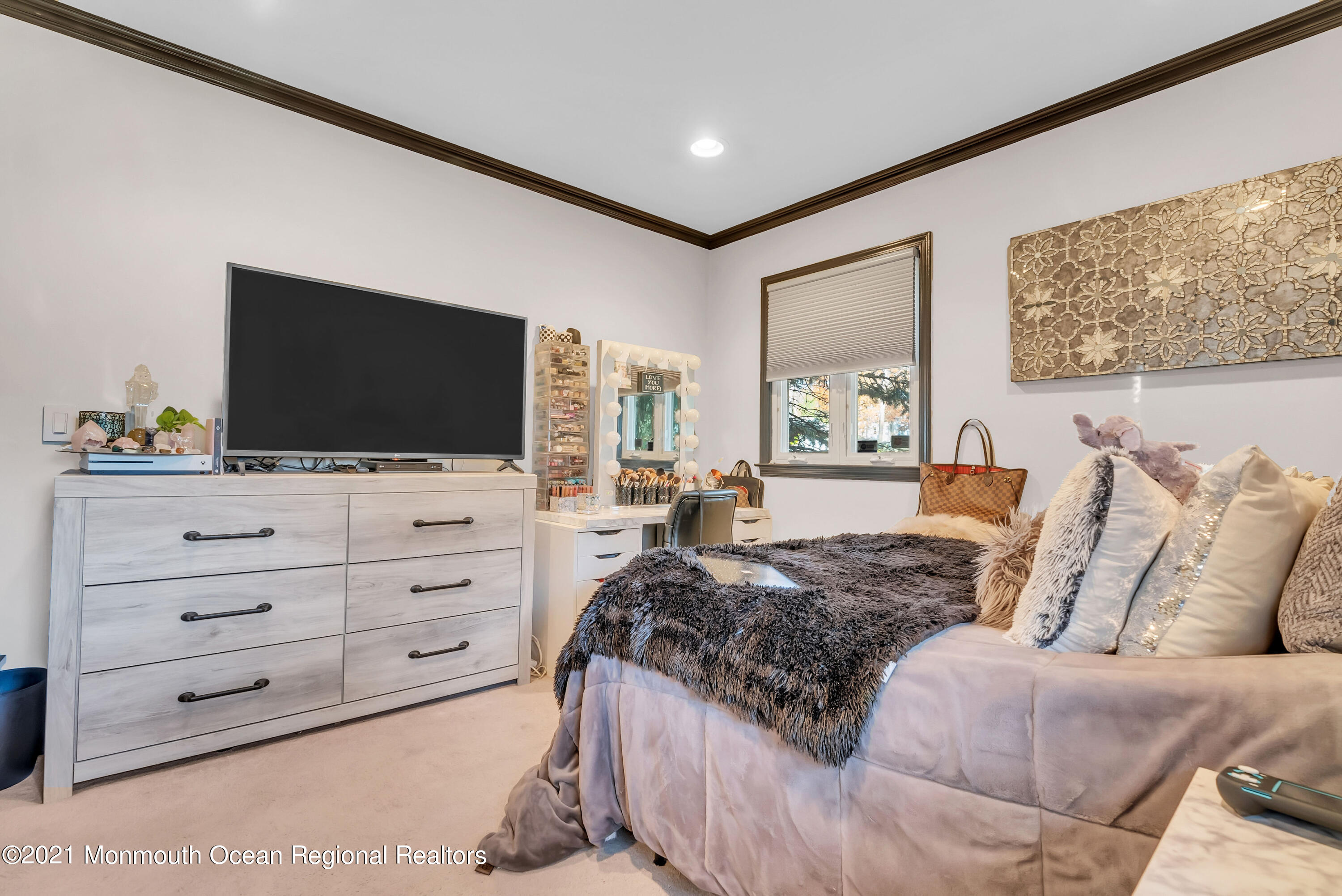 128 Whalepond Road Oakhurst, NJ 07755 - Photo 22 of 33 a living room with furniture and a flat screen tv
