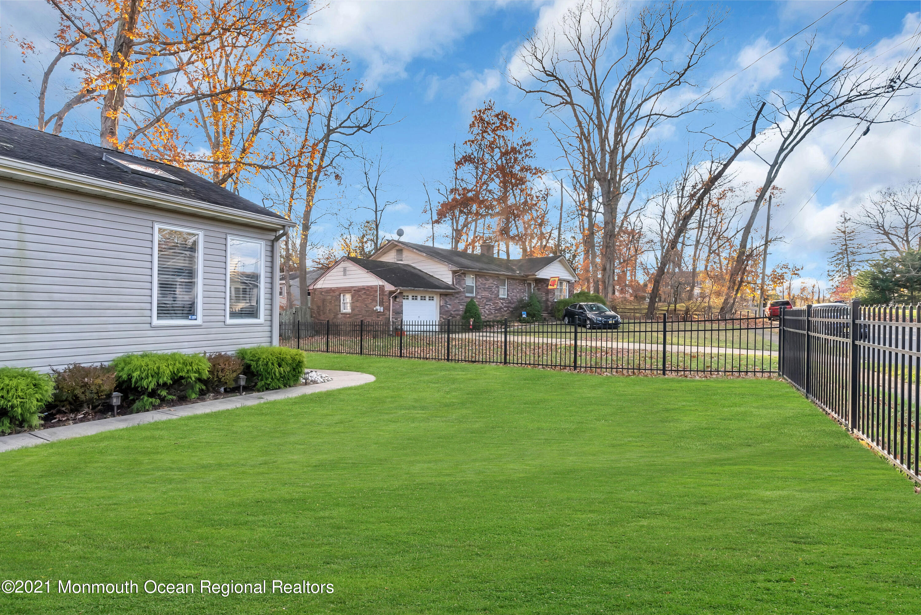 128 Whalepond Road Oakhurst, NJ 07755 - Photo 31 of 33 a view of a backyard