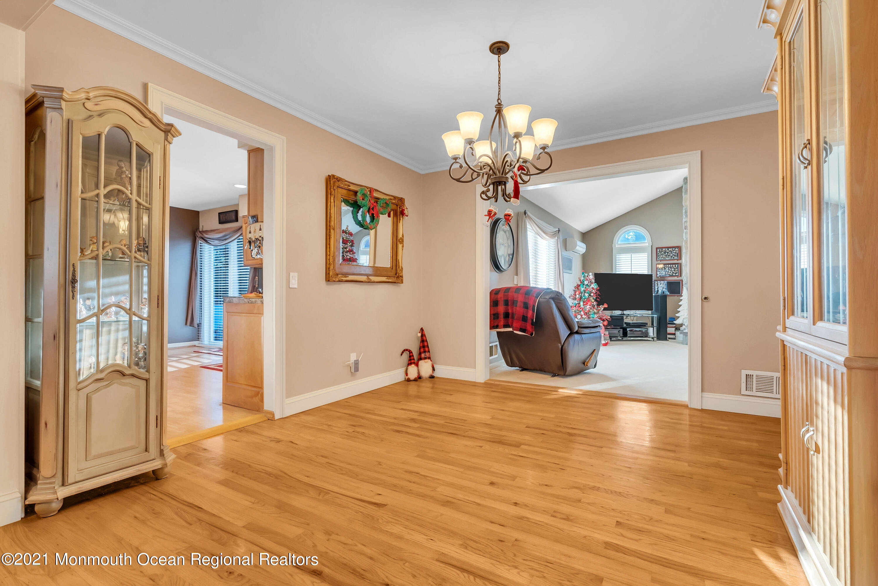 128 Whalepond Road Oakhurst, NJ 07755 - Photo 8 of 33 a view of a livingroom with a chandelier