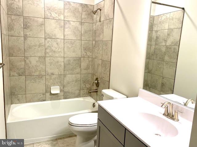 22538 Foundation Drive Ashburn, VA 20148 - Photo 24 of 33 Hall Bath - Upgraded Floor and Shower Tiles