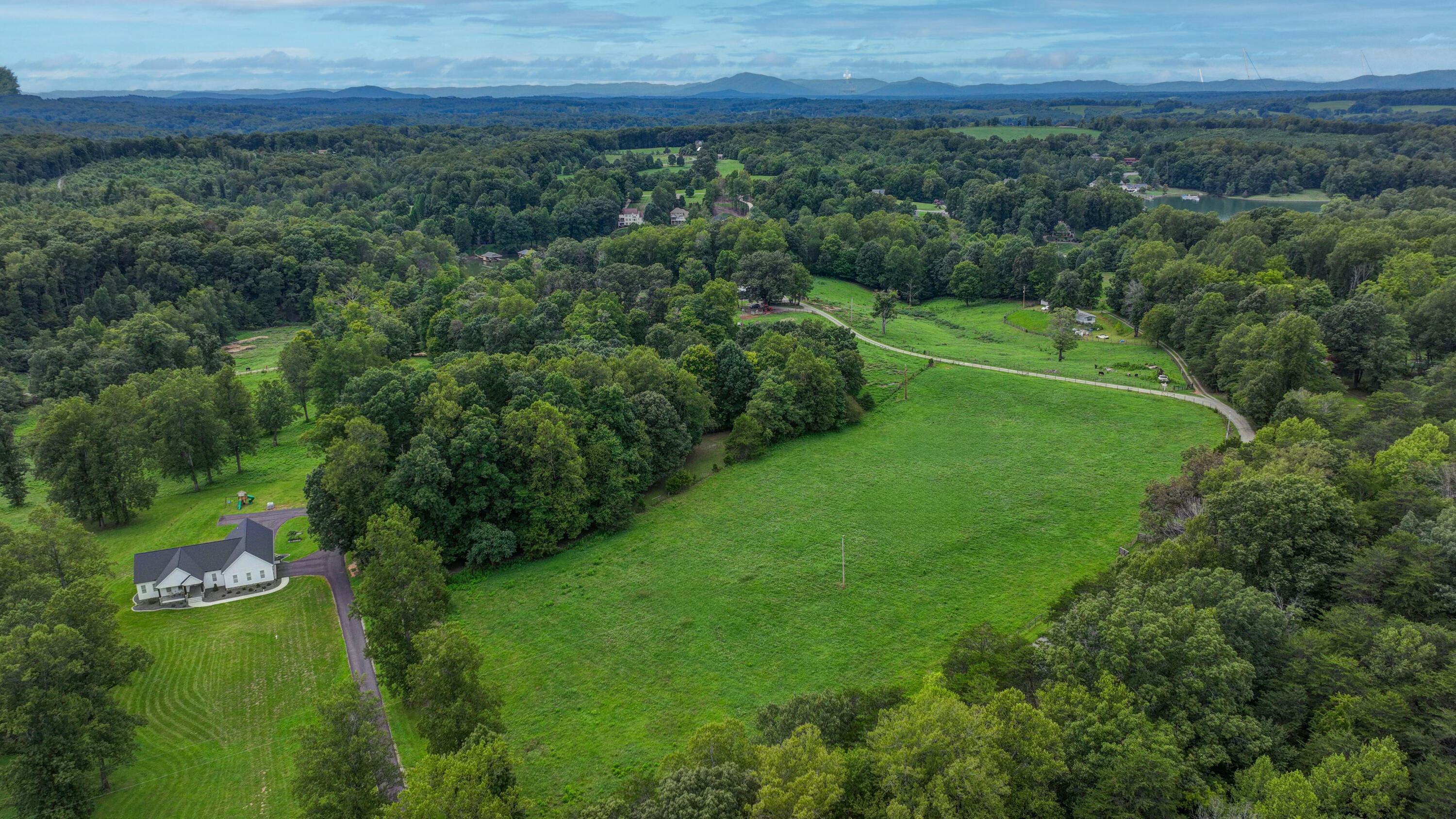 Lot A Kemp Ford Road Union Hall, VA 24176 - Photo 3 of 8 a view of a lush green outdoor space with a lake view