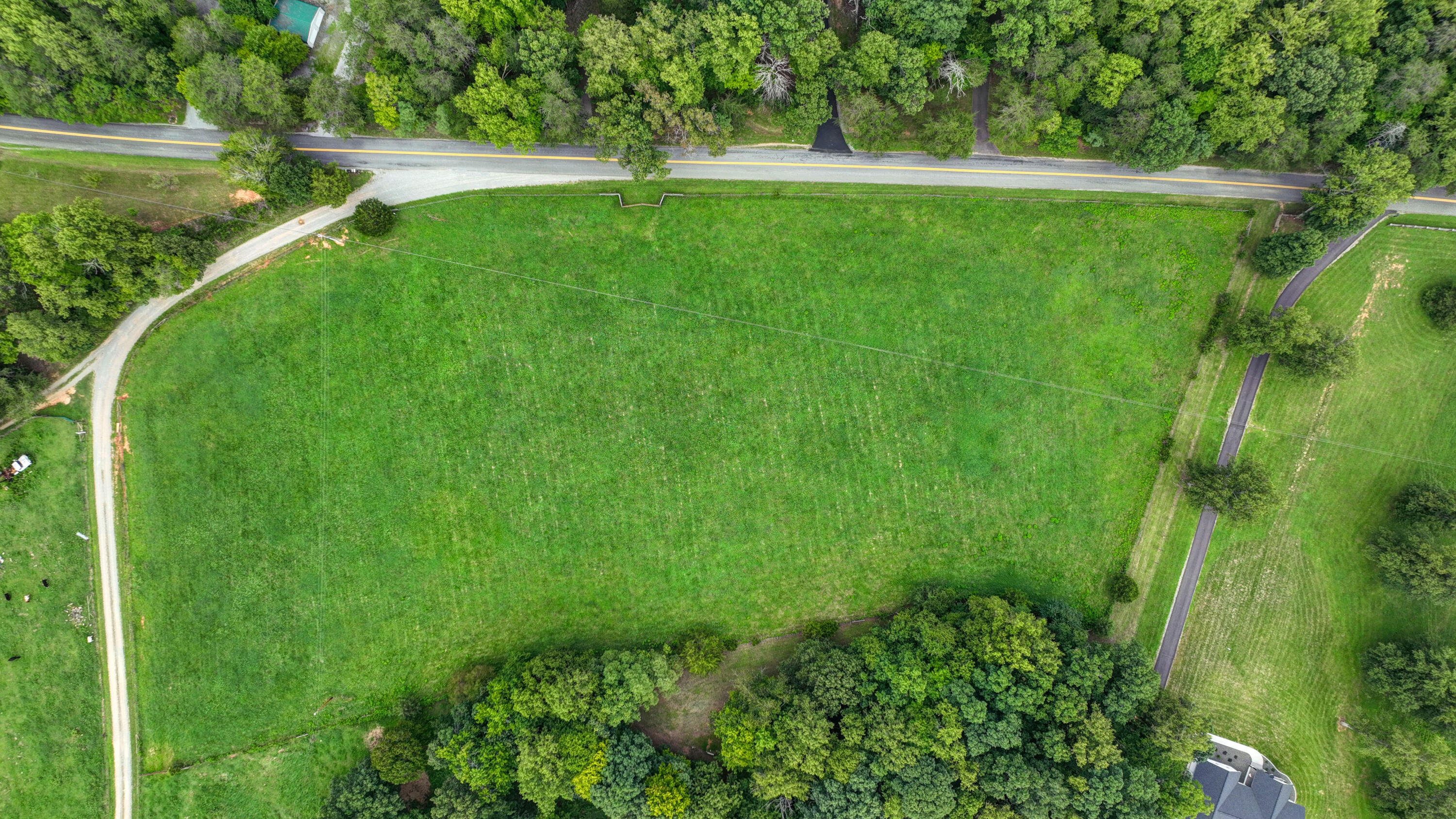 Lot A Kemp Ford Road Union Hall, VA 24176 - Photo 4 of 8 a view of a lake with a yard