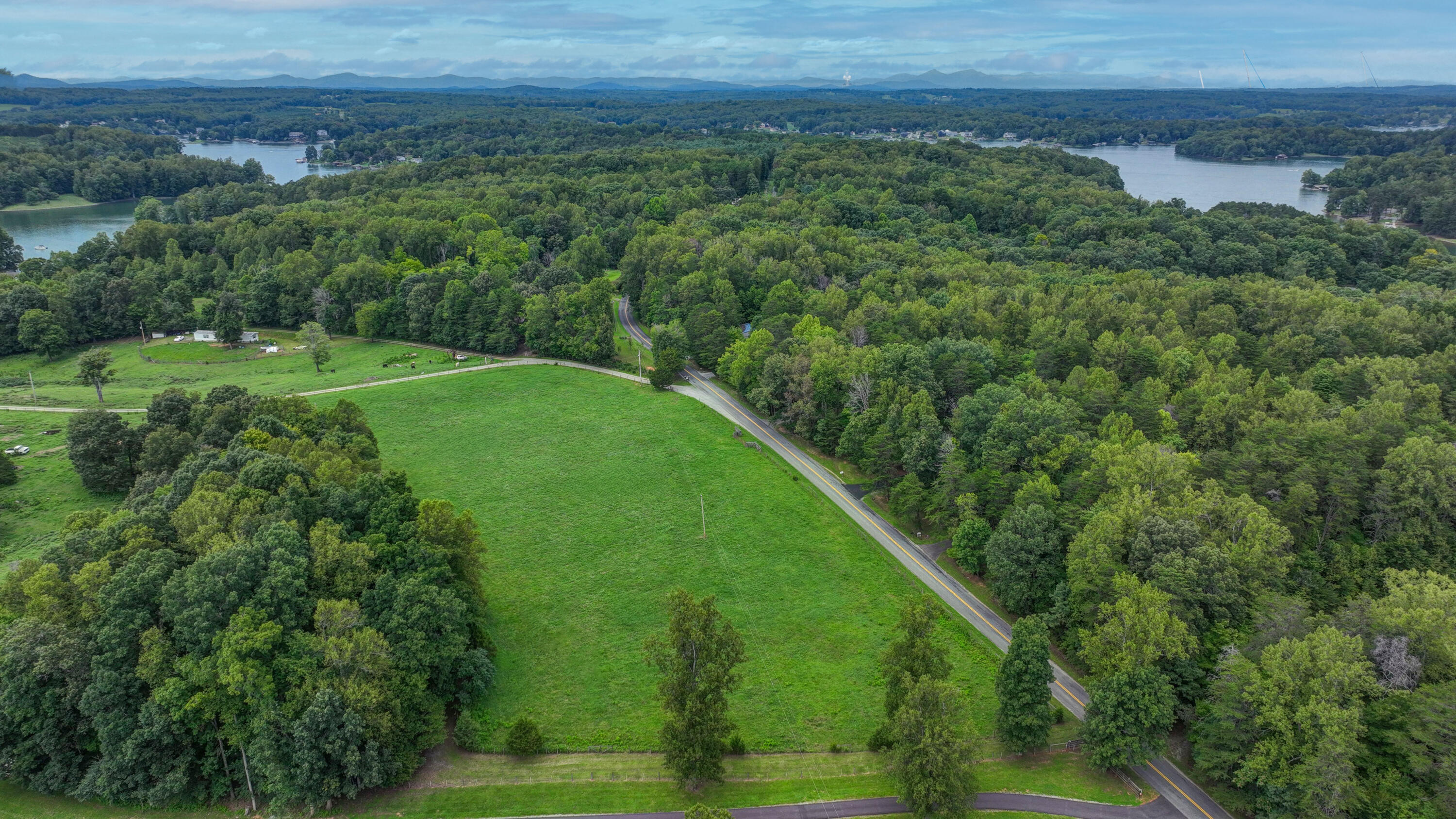 Lot A Kemp Ford Road Union Hall, VA 24176 - Photo 6 of 8 a view of a lush green outdoor space with a lake view