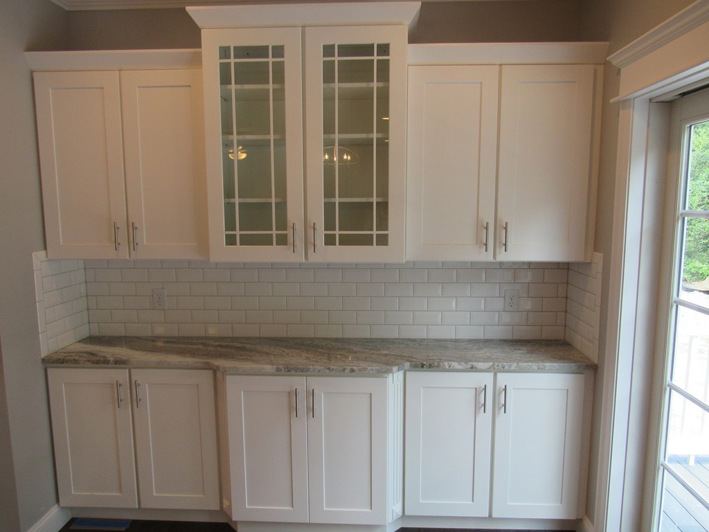 58 Ridge View Road Northampton, MA 01062 - Photo 9 of 15 a kitchen with granite countertop white cabinets and sink