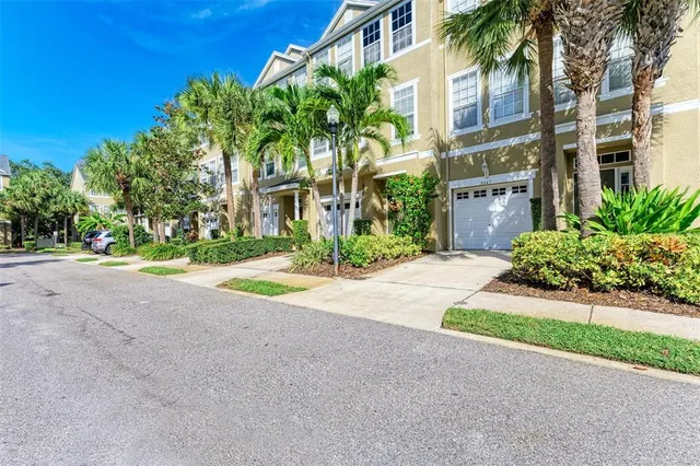 a view of a building with a yard