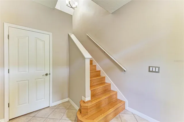 a kitchen with stainless steel appliances a refrigerator sink and cabinets