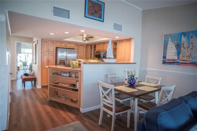 a view of a livingroom with furniture and a window