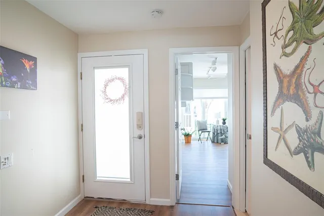 a bathroom with a sink mirror toilet and shower