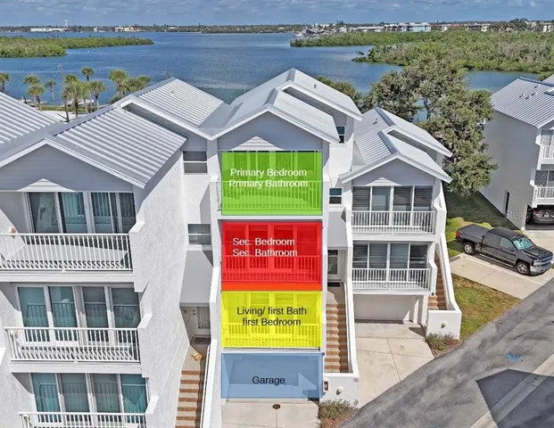 a bathroom with a sink toilet and a mirror