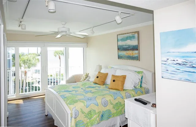 a bedroom with bed and a window