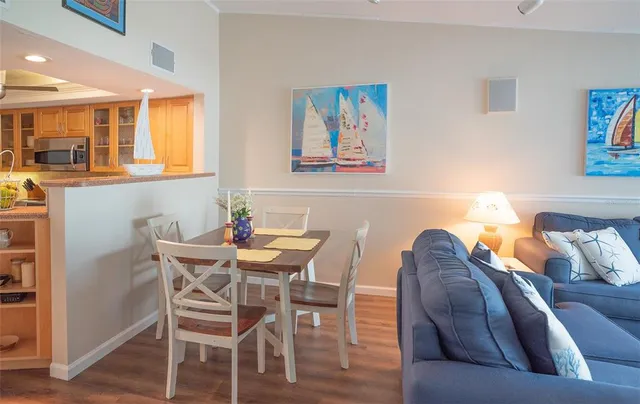 an aerial view of a house with a swimming pool