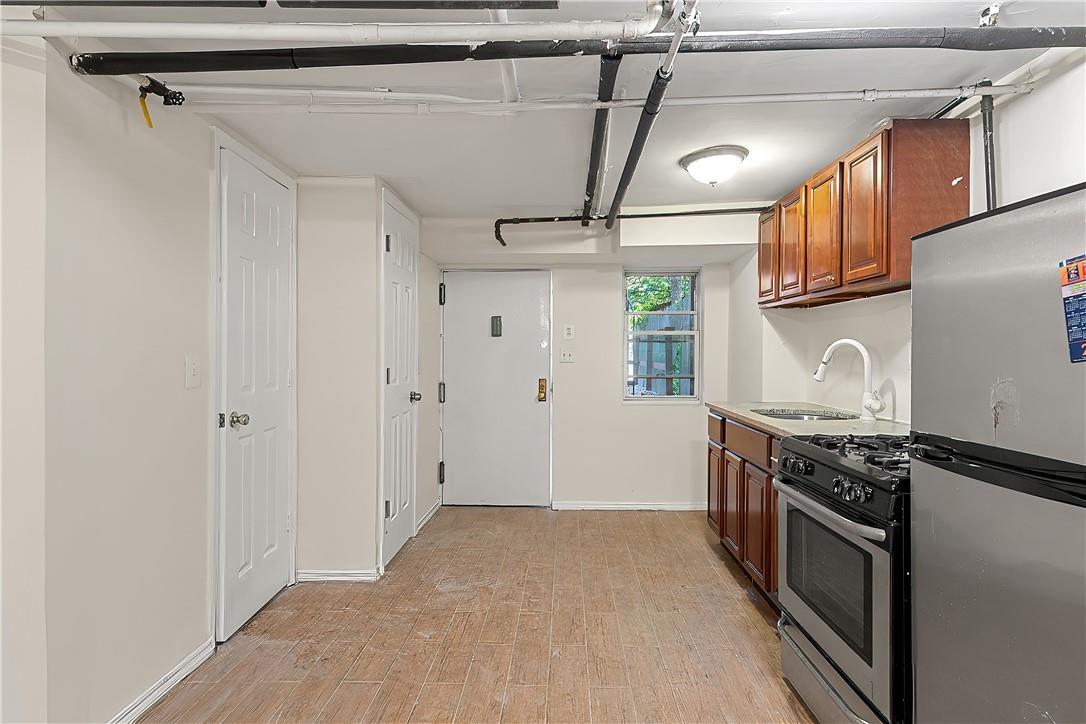 3121 Corlear Avenue Bronx, NY 10463 - Photo 22 of 28 basement studio separate entrance and back yard access