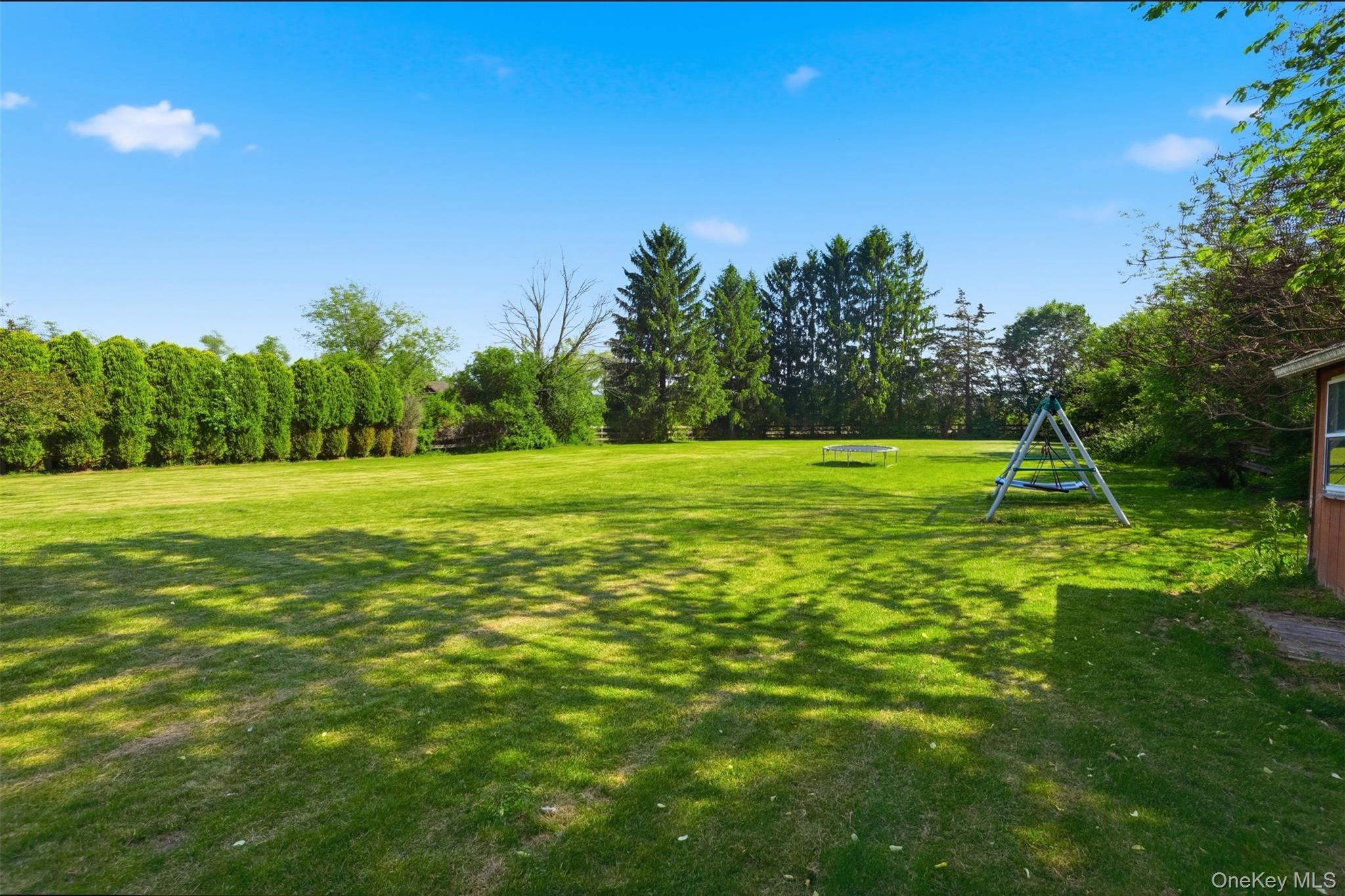 147 County Rte 1 Warwick, NY 10990 - Photo 42 of 45 a view of a field with trees in the background