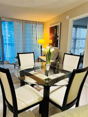 a view of a workspace with furniture