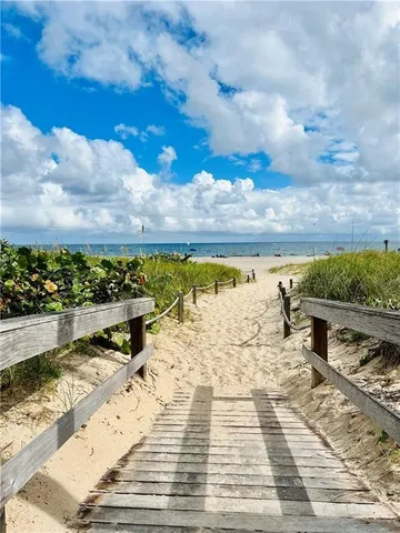 a view of an ocean with beach