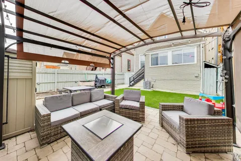 a building outdoor space with patio furniture