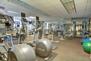 208 West Washington Street, Unit 1002 Chicago, IL 60606 - Photo 16 of 16 a view of a room with gym equipment