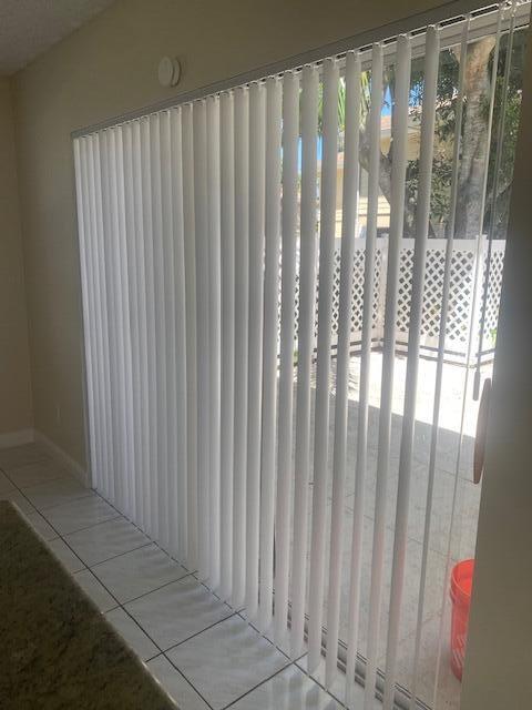 4701 Roxbury Court Boynton Beach, FL 33436 - Photo 6 of 29 Kitchen slider to patio