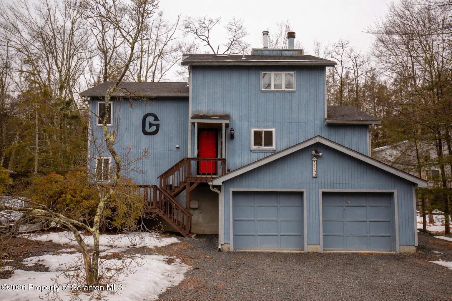 a house view with a outdoor space