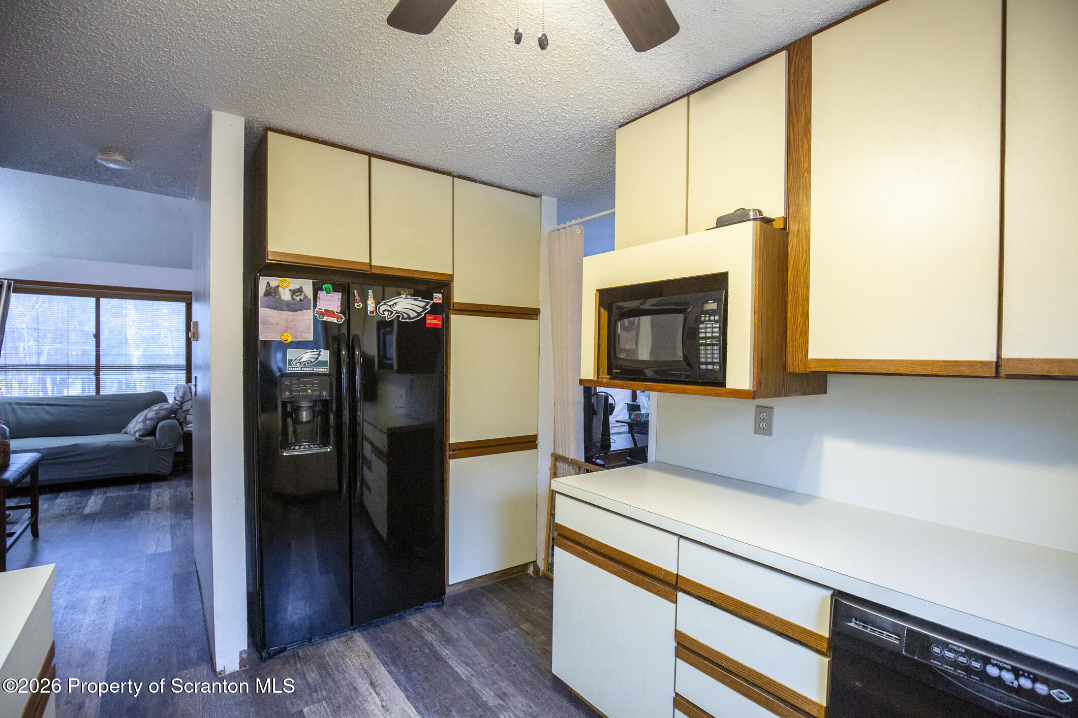 1290 Brookfield Road Lake Ariel, PA 18436 - Photo 20 of 47 a kitchen with stainless steel appliances a microwave a stove and cabinets