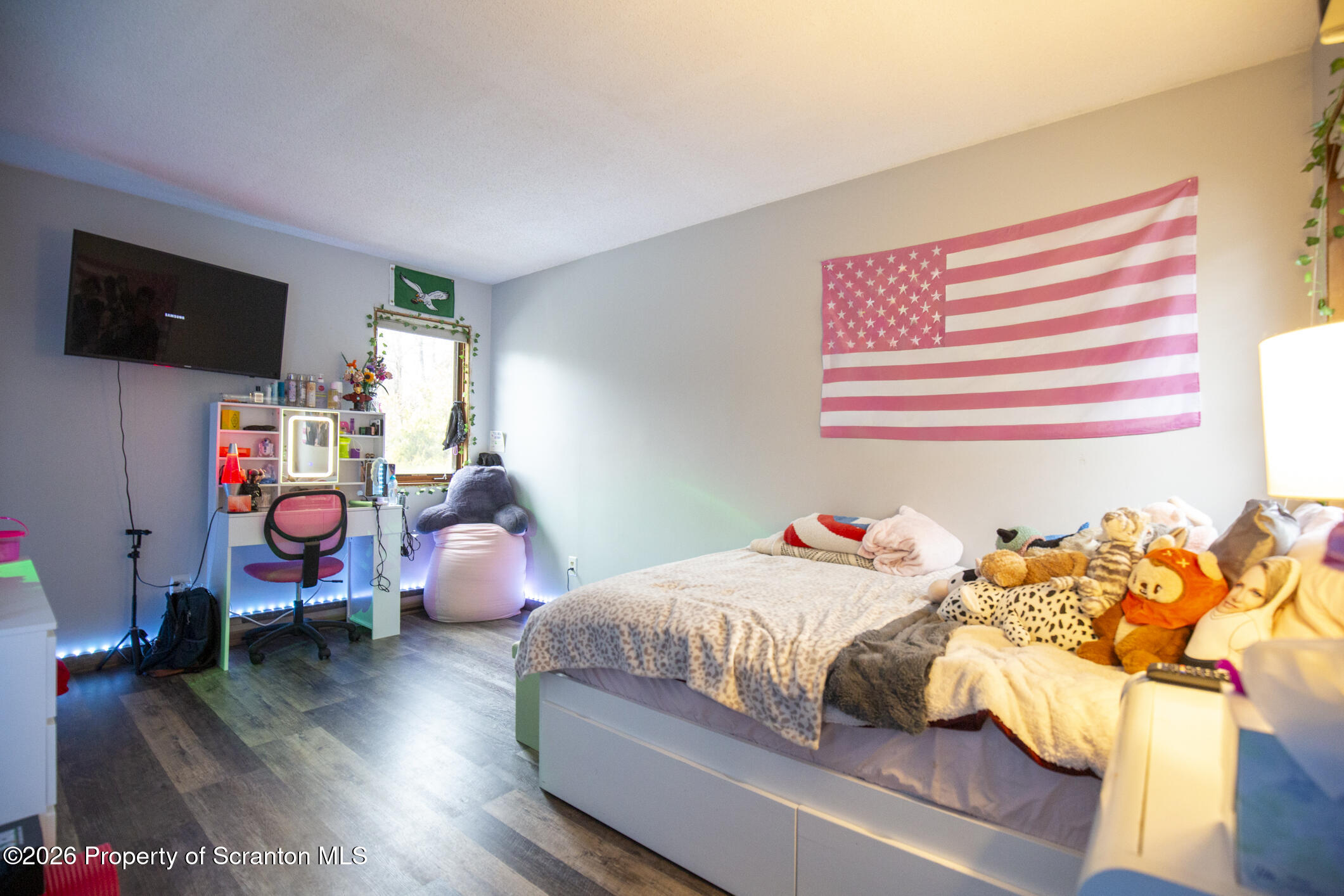 1290 Brookfield Road Lake Ariel, PA 18436 - Photo 28 of 47 a bedroom with a bed and wooden floor