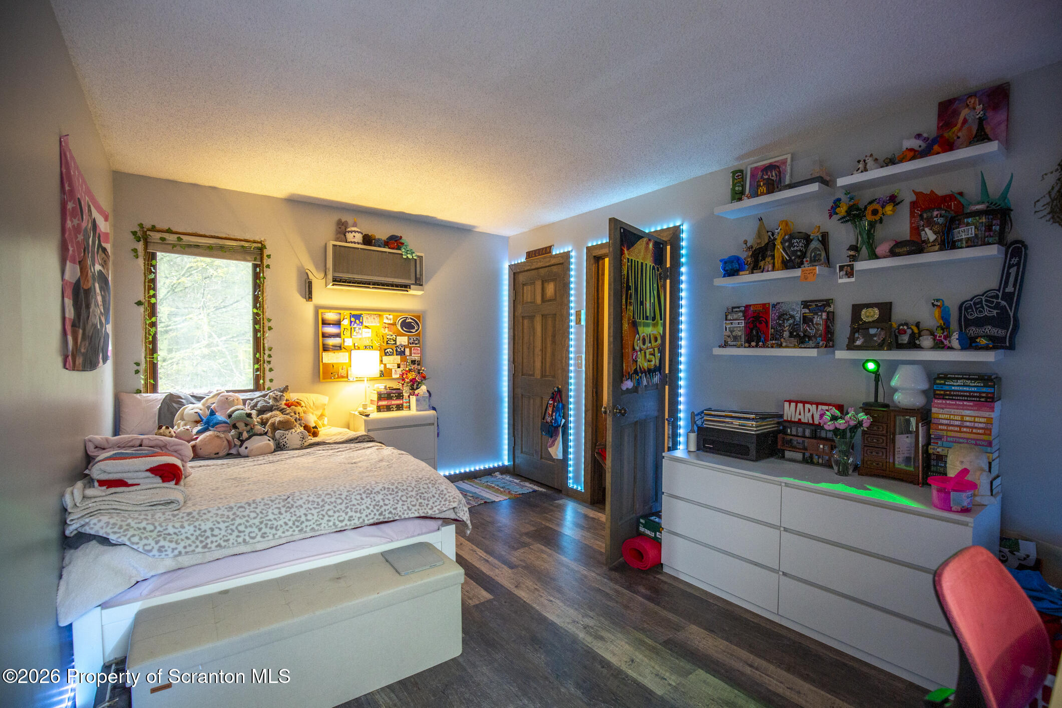 1290 Brookfield Road Lake Ariel, PA 18436 - Photo 30 of 47 a bedroom with bed and a book shelf