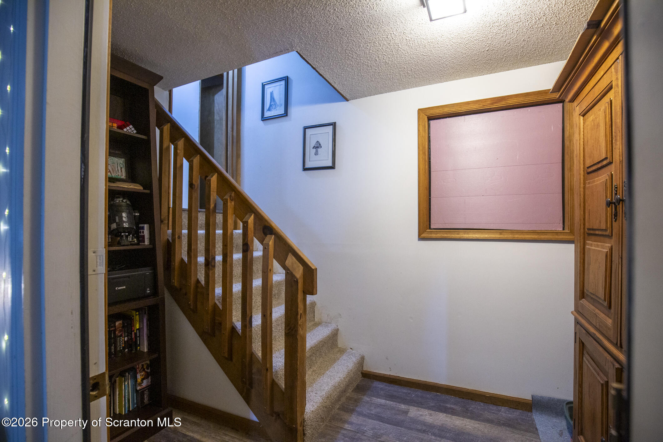 1290 Brookfield Road Lake Ariel, PA 18436 - Photo 41 of 47 a view of an entryway with wooden floor and stairs