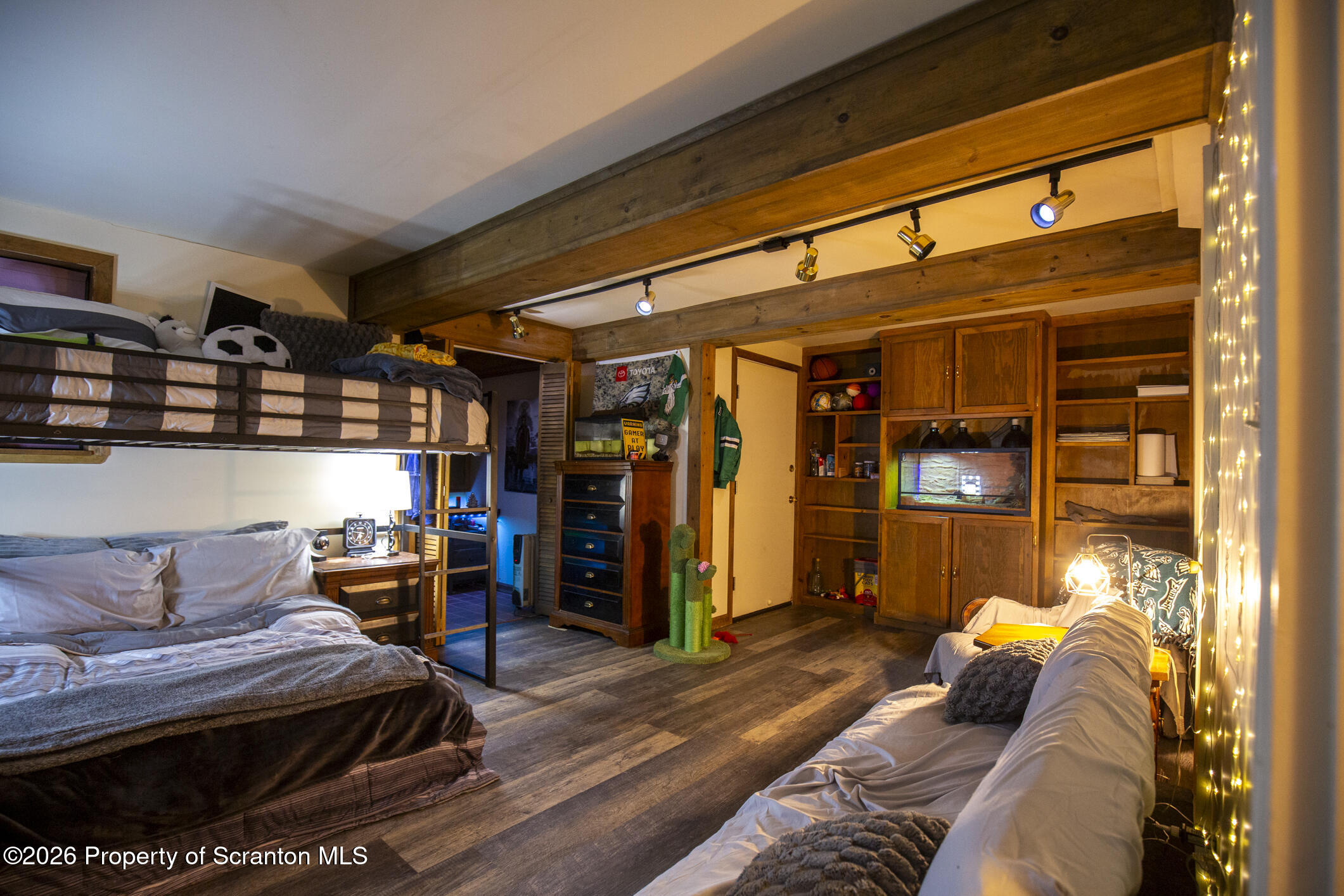 1290 Brookfield Road Lake Ariel, PA 18436 - Photo 42 of 47 a living room with furniture a lamp and a window