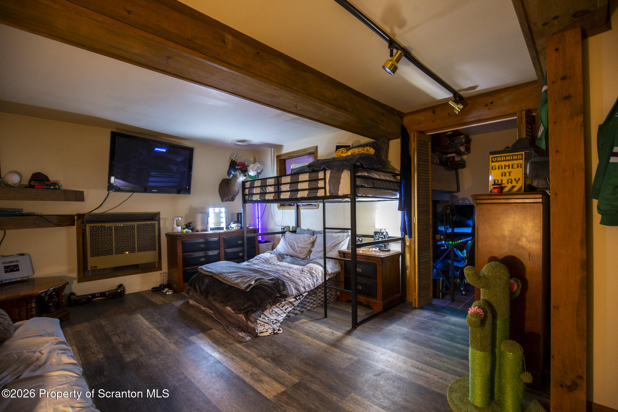 1290 Brookfield Road Lake Ariel, PA 18436 - Photo 44 of 47 a bedroom with furniture and a flat screen tv