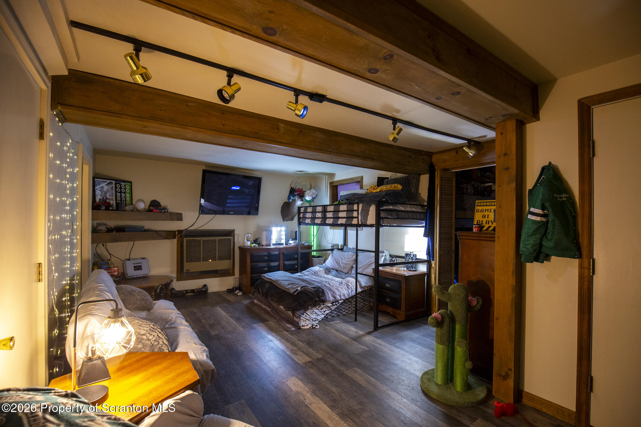 1290 Brookfield Road Lake Ariel, PA 18436 - Photo 46 of 47 a living room with furniture and a flat screen tv