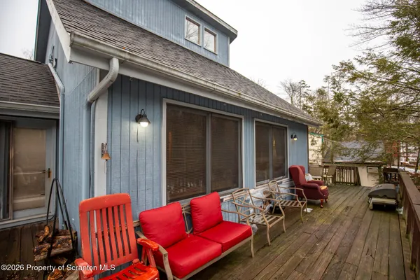 a backyard of a house with seating space