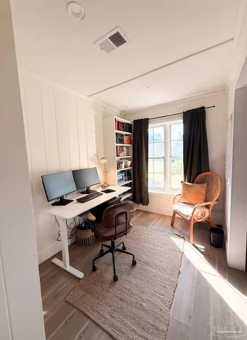 a workspace with furniture and a window