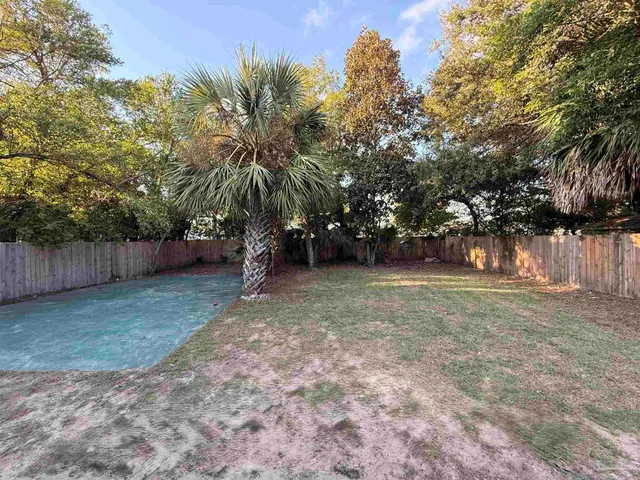 a view of backyard with green space