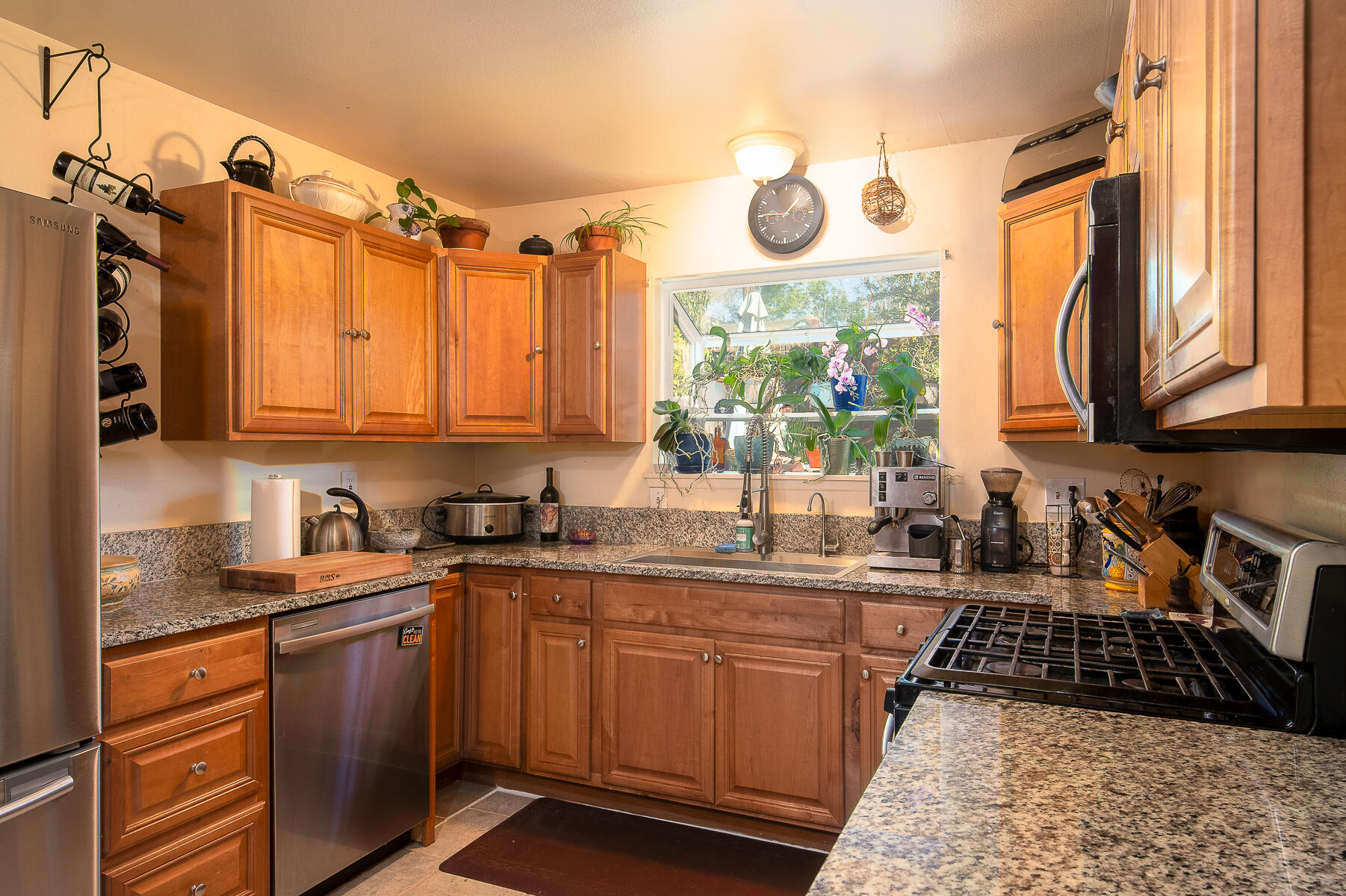 348 Coronado Drive Goleta, CA 93117 - Photo 15 of 21 a kitchen with a sink stove and microwave