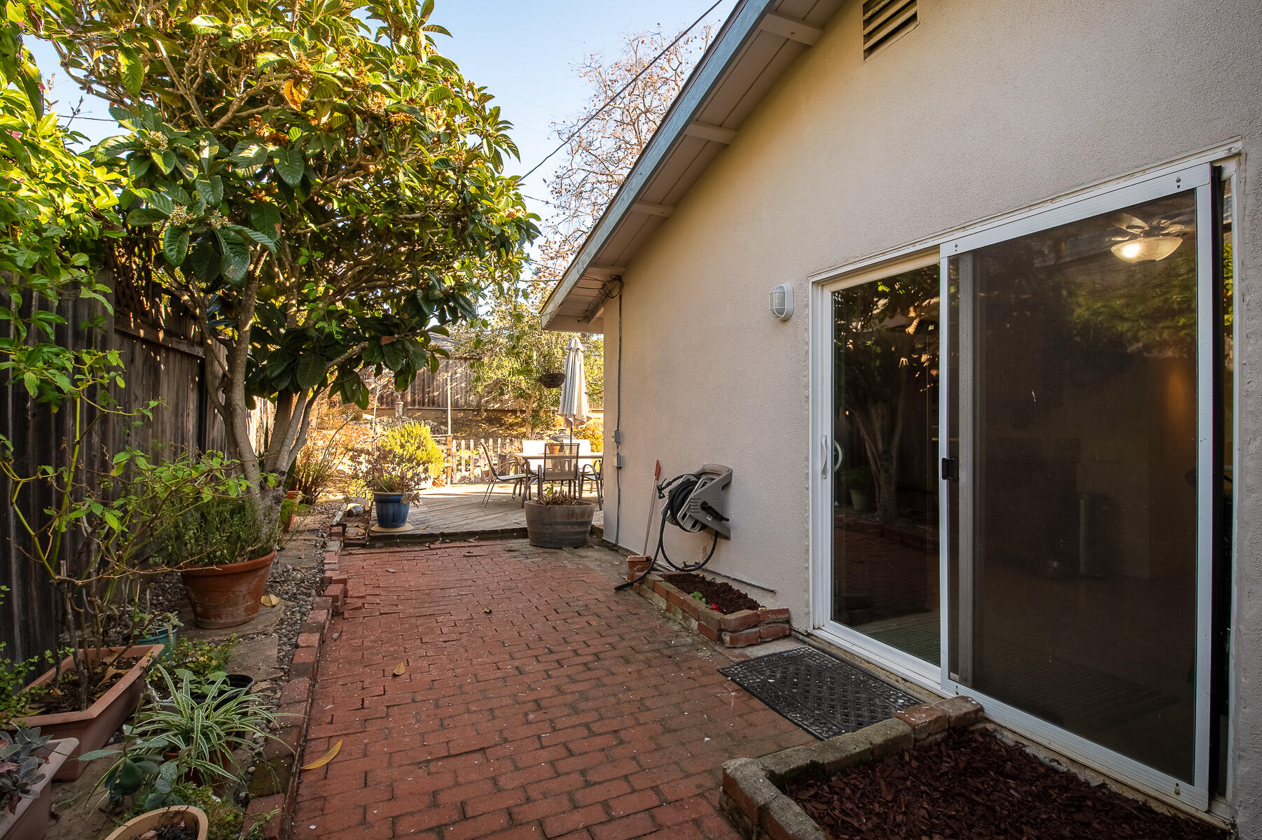 348 Coronado Drive Goleta, CA 93117 - Photo 16 of 21 a view of a porch with furniture and floor to ceiling window