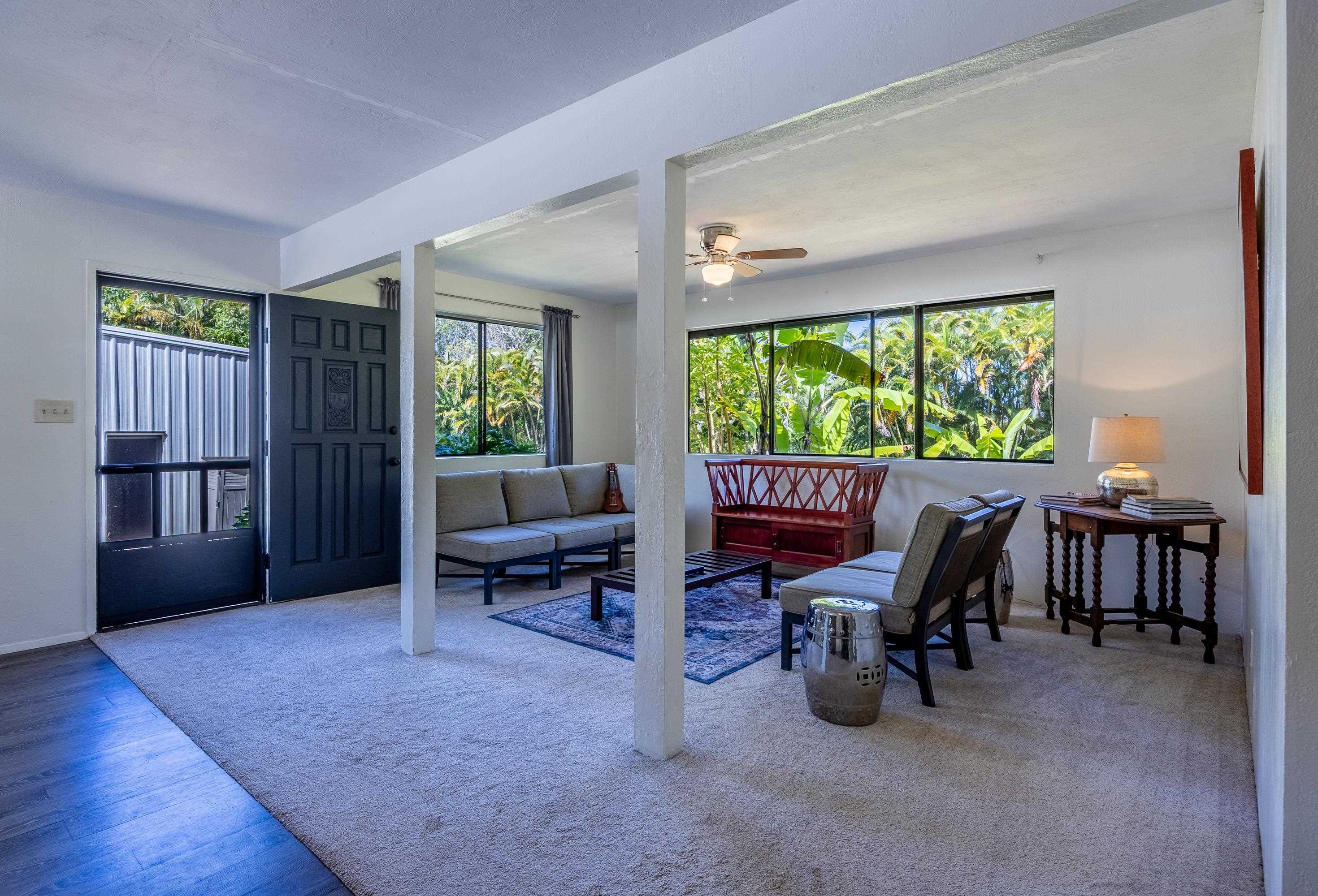 81 Kapuai Road Haiku, HI 96708 - Photo 11 of 50 a view of a livingroom with furniture and a window