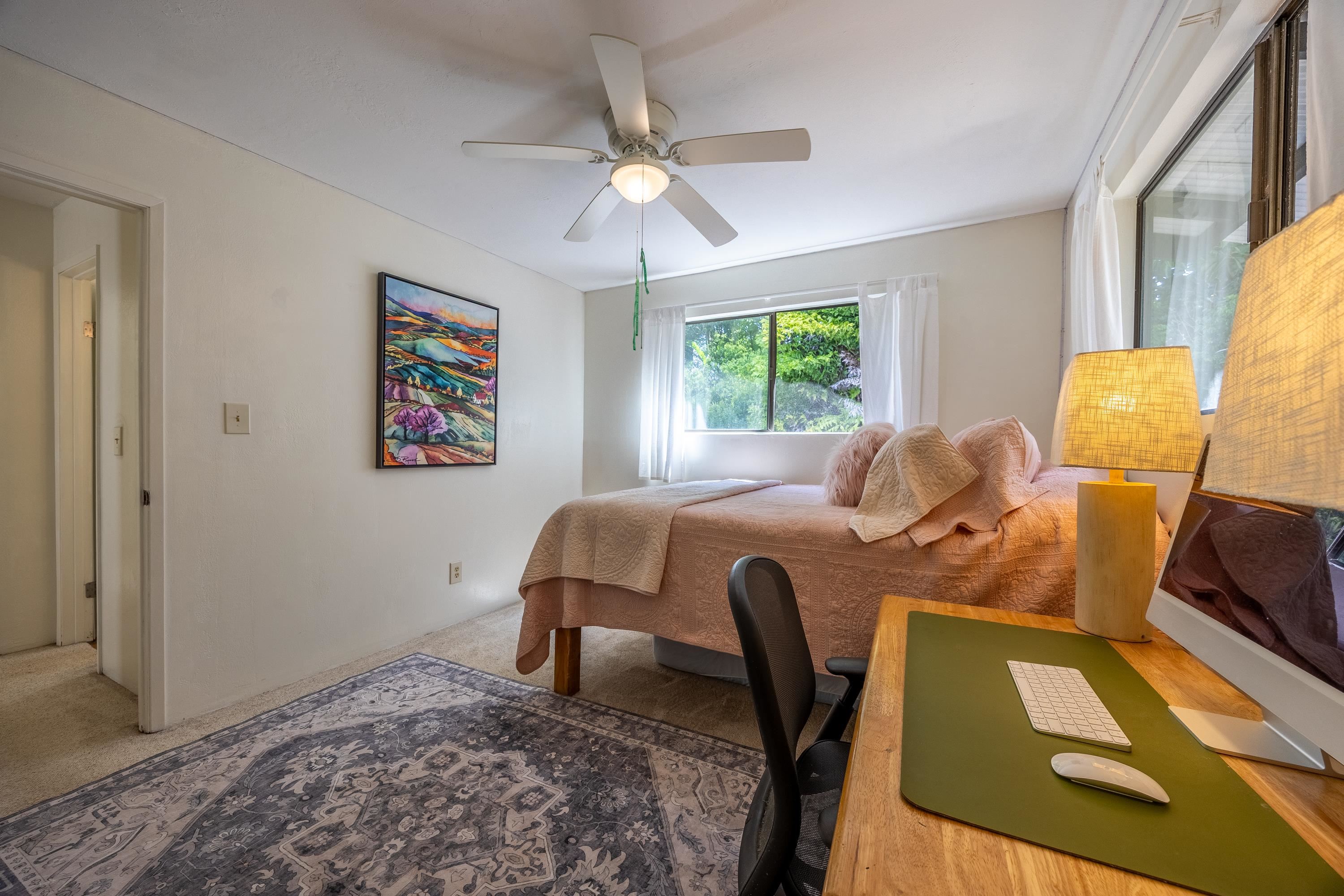 81 Kapuai Road Haiku, HI 96708 - Photo 27 of 50 a bed room with a bed furniture and a window