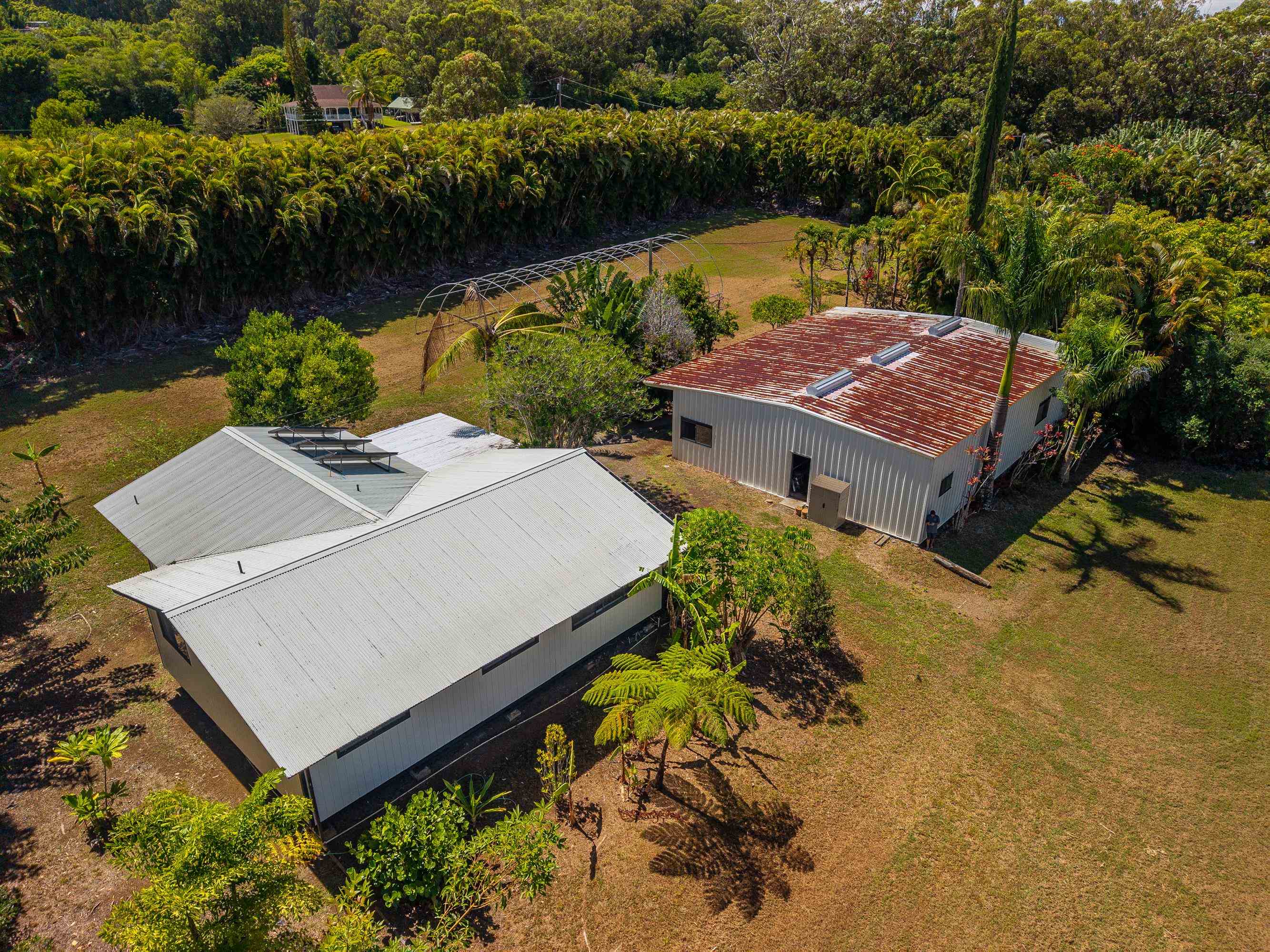 81 Kapuai Road Haiku, HI 96708 - Photo 44 of 50 an aerial view of a house with a lake view