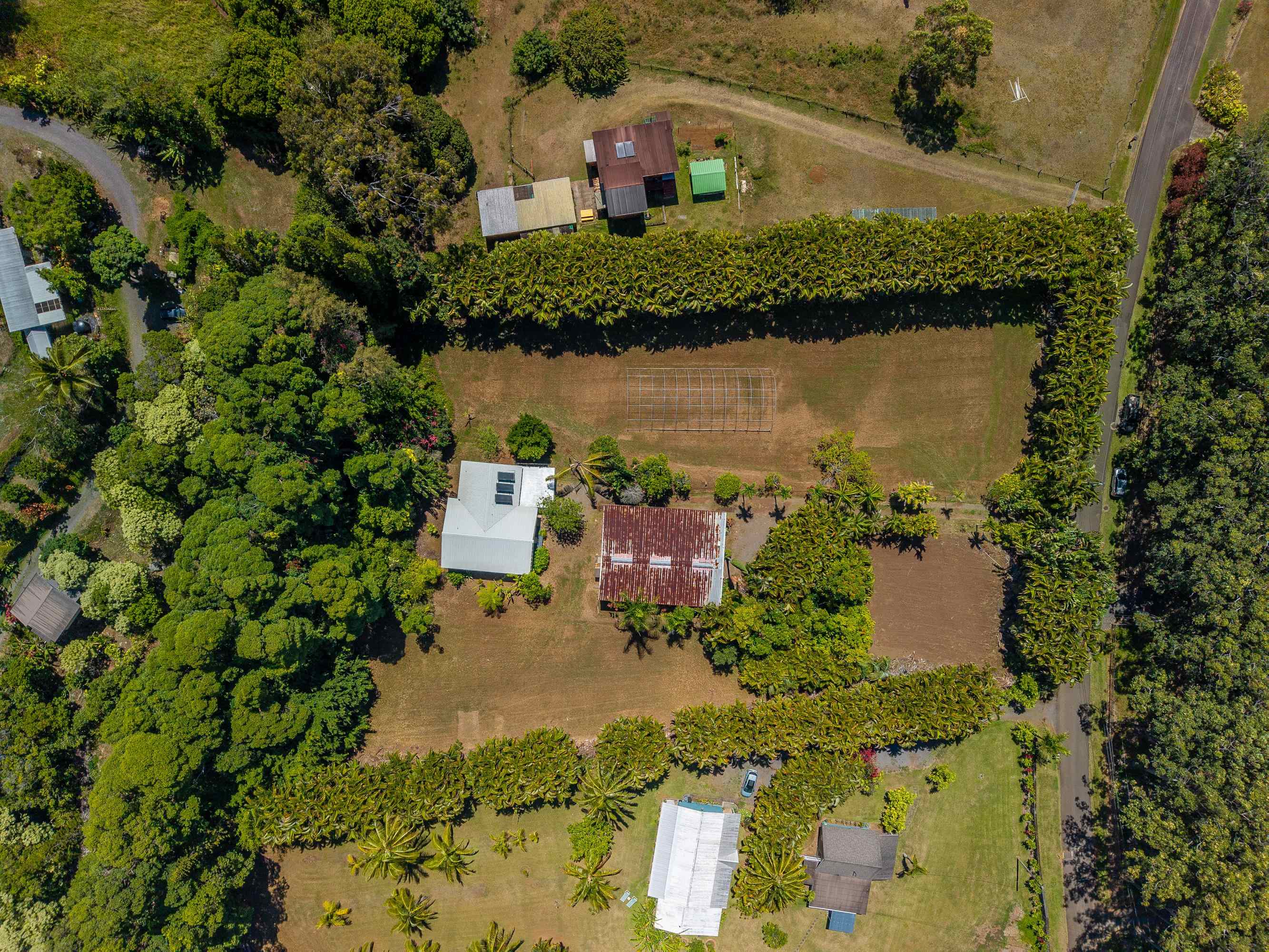 81 Kapuai Road Haiku, HI 96708 - Photo 47 of 50 an aerial view of a house with a lake view