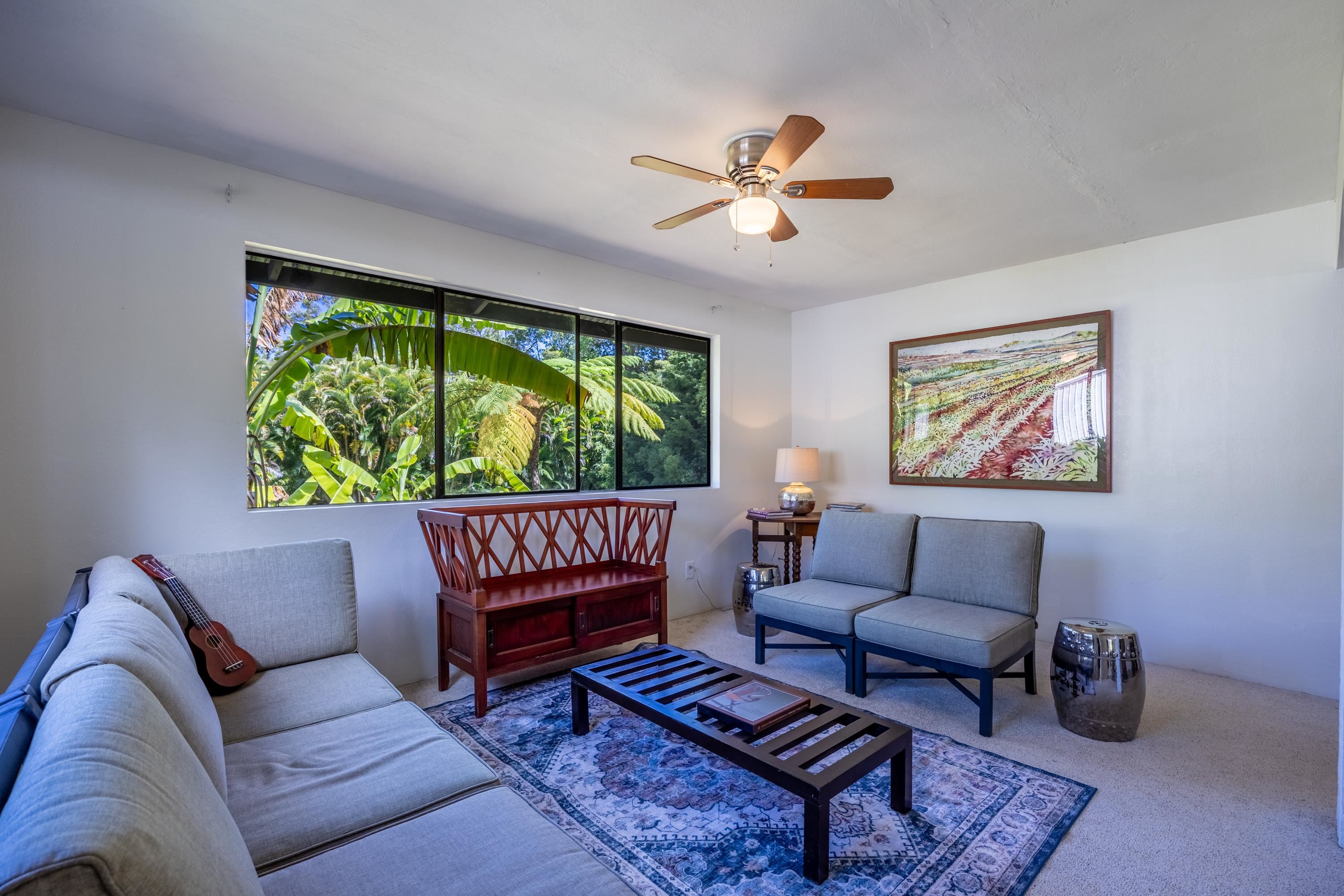 81 Kapuai Road Haiku, HI 96708 - Photo 8 of 50 a living room with furniture and a window