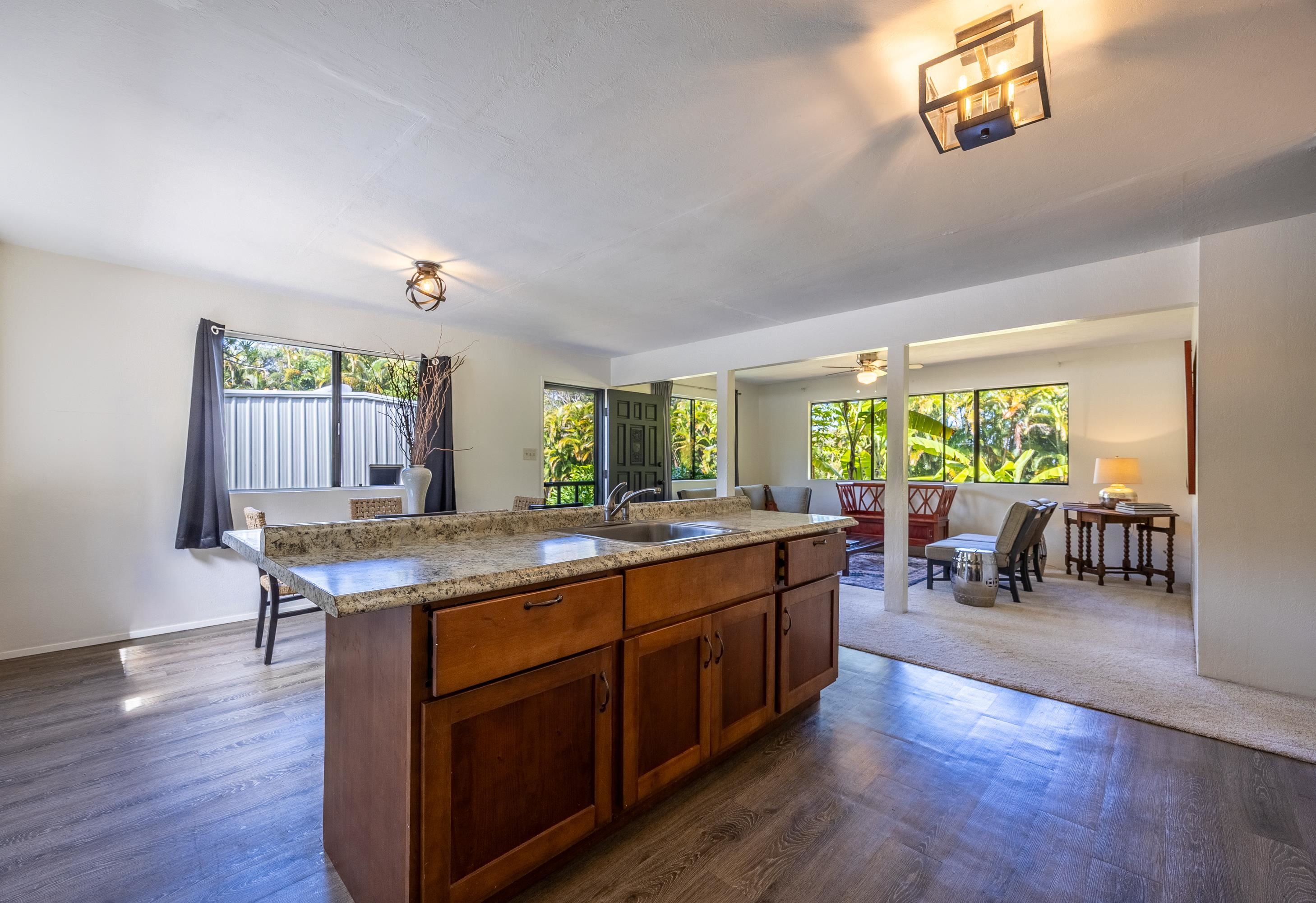 81 Kapuai Road Haiku, HI 96708 - Photo 10 of 50 a kitchen with a sink and view of living room