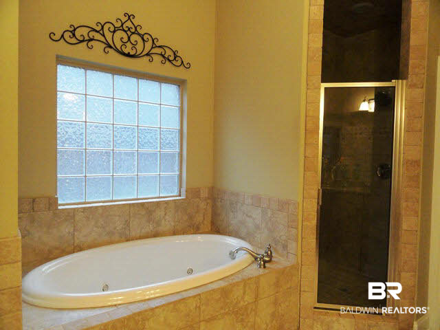 32122 Weatherly Cove Daphne, AL 36527 - Photo 18 of 26 Master Bath with Gorgeous Tile Tub Surround and Separate Shower