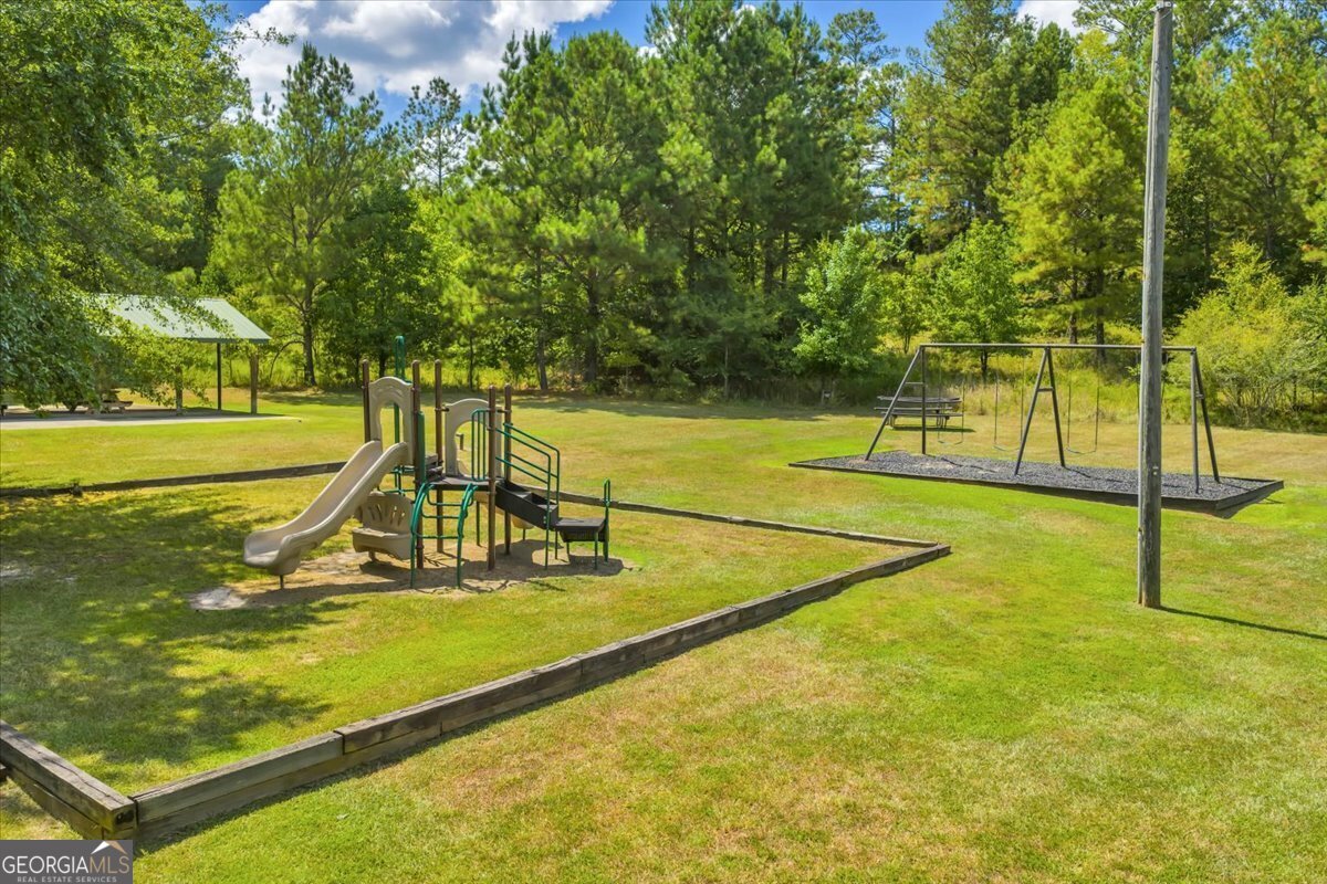 216 River Hills Ridge Road Macon, GA 31211 - Photo 13 of 13 a view of a tennis court
