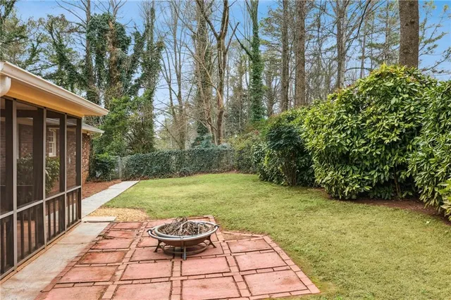 a view of backyard with outdoor space