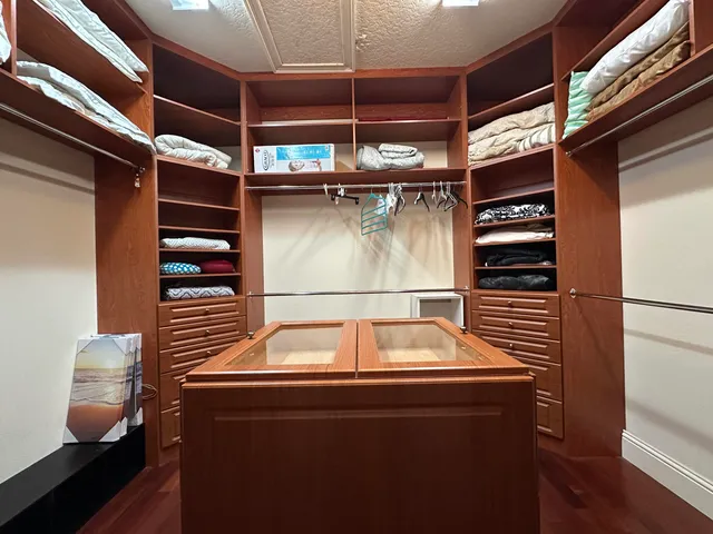 a view of a porch with a table and chairs